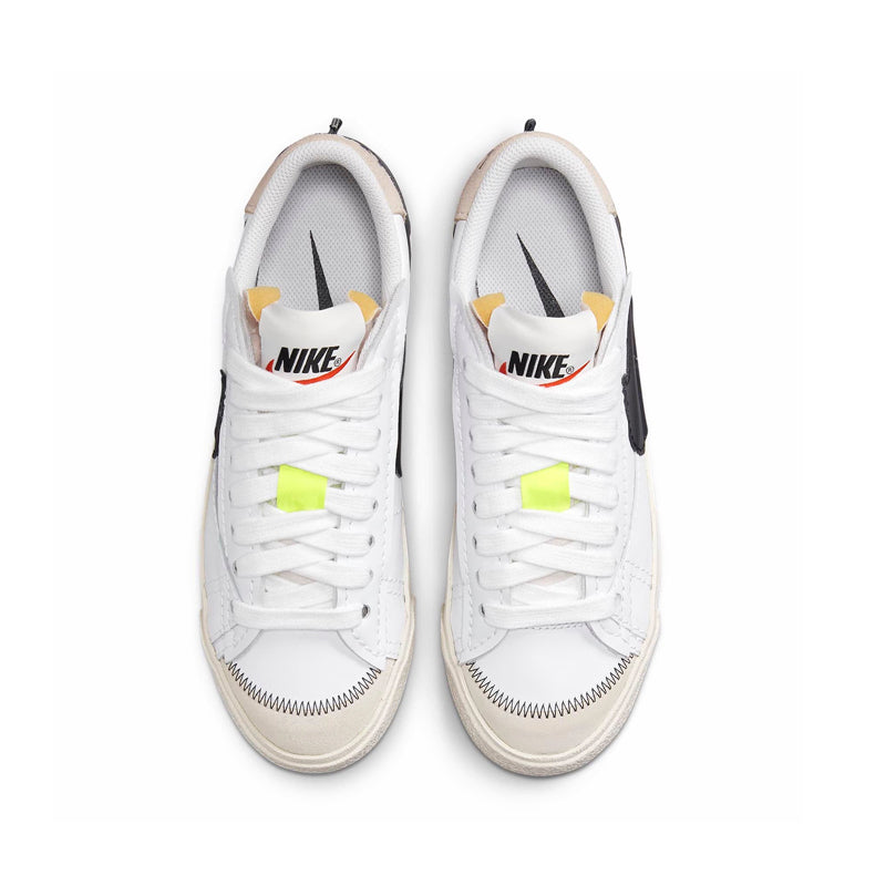 Nike blazer low oversized swoosh best sale